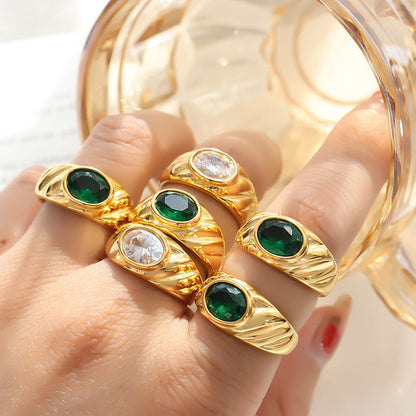 Gold ring with white and green diamonds