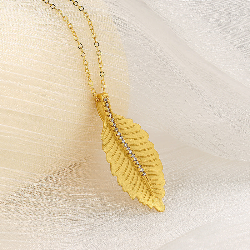 14K Gold leaf necklace with diamond