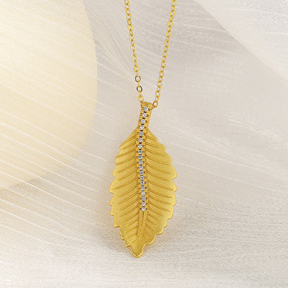 14K Gold leaf necklace with diamond